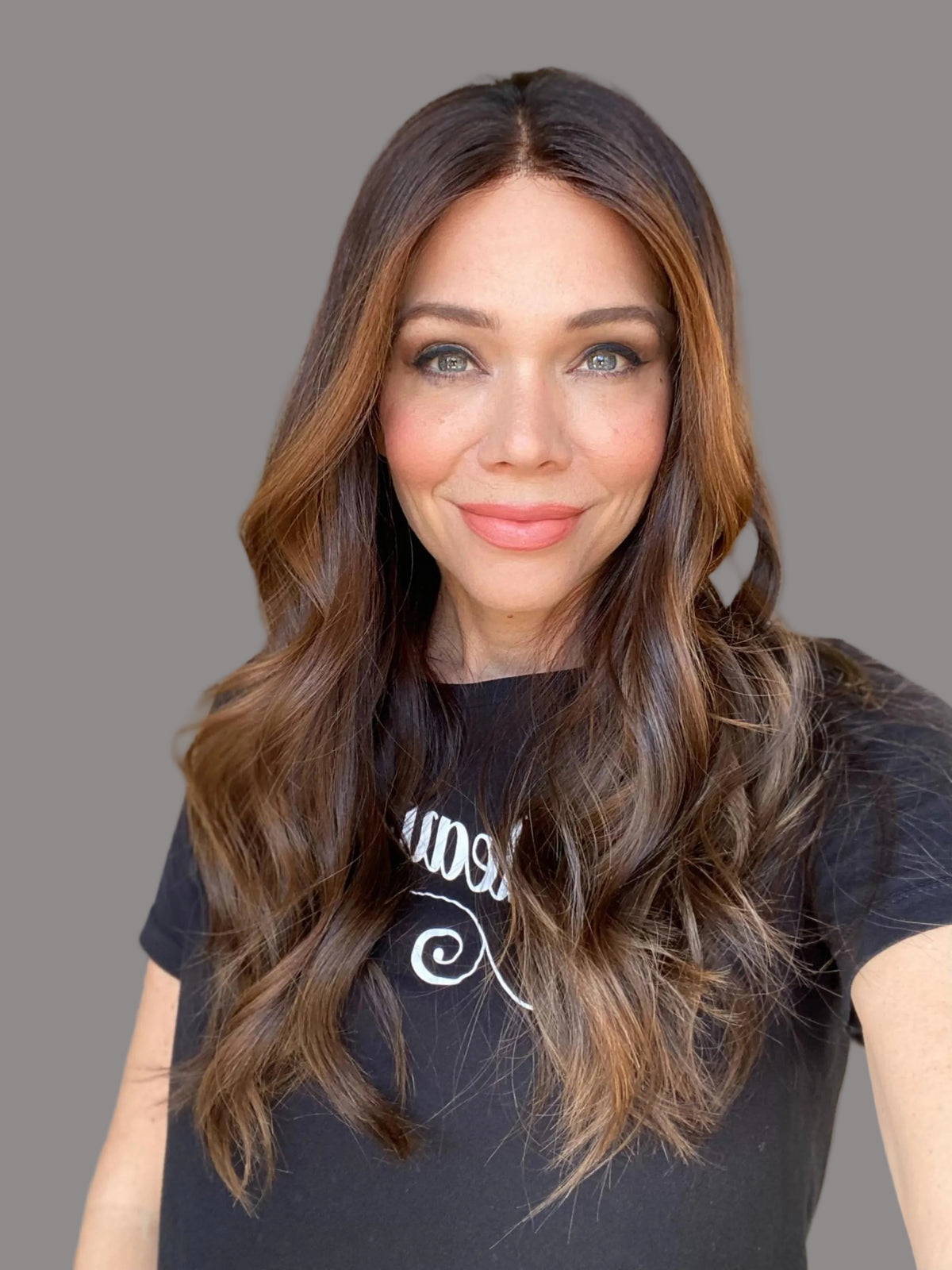 Human hair dark brunette with with warm highights 